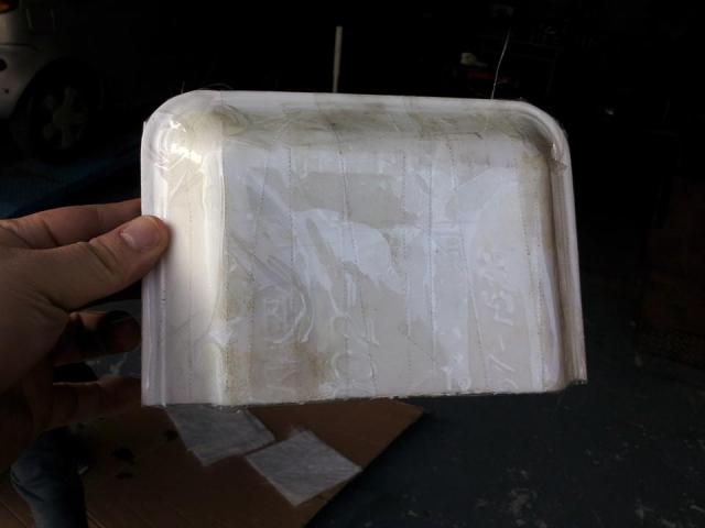 Half of what used to be pork packaging. You have to cover this stuff with tape or the resin will dissolve it.