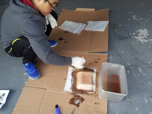 Applying more resin.