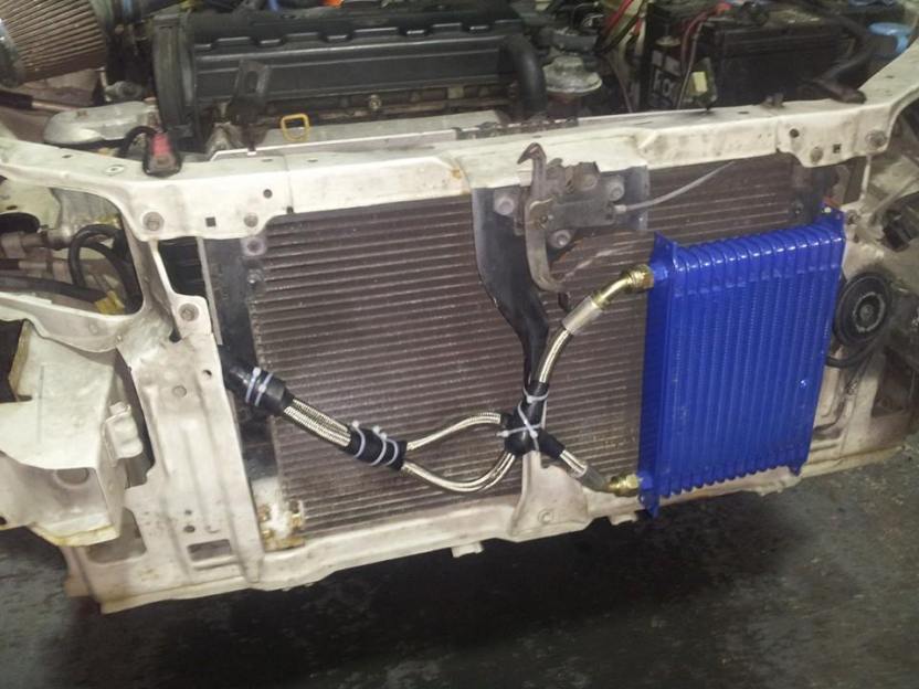 Oil cooler. You can see how I protected the ridiculous steel braided lines from themselves. 