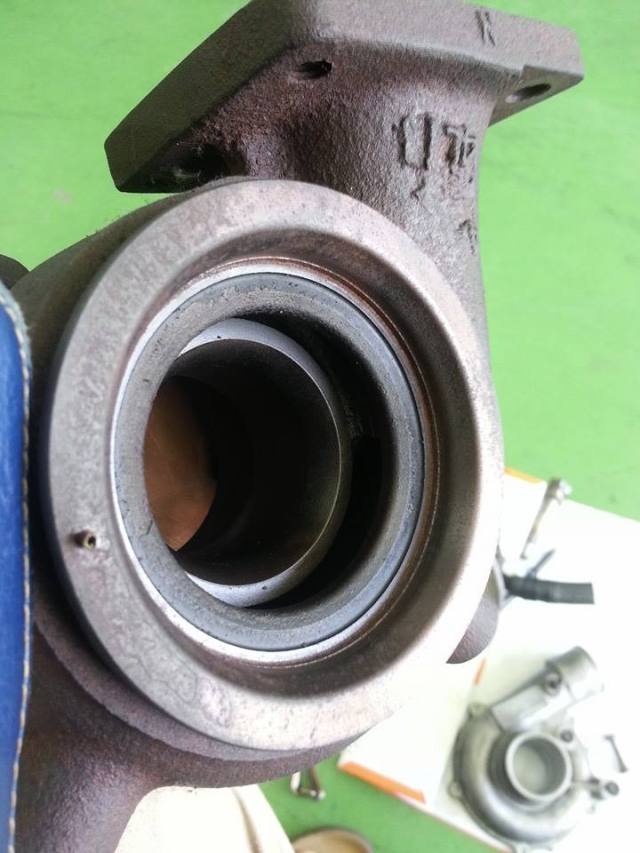 Exhaust housing on the turbo. Taking this thing apart, I was amazed at how good the condition is. You normally don't get healthy turbochargers for $50. 