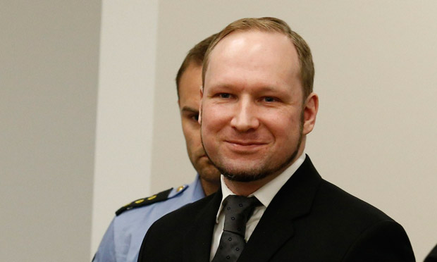 Anders Behring Breivik smiling in court