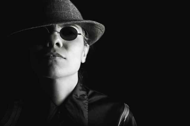 person-sunglasses-dark-hat